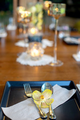 Dinner set on the wood table with long wine glass