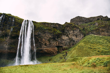Fototapeta na wymiar Fantastic Seljalandsfoss waterfall in Iceland during sunny day.