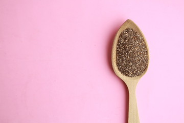wooden spoon with black chia seeds