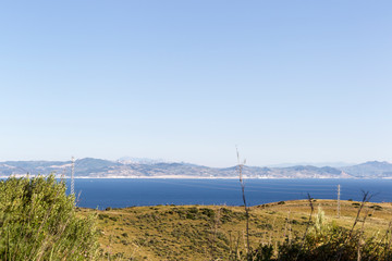 Street of Gibraltar with view from Spain on Morocco