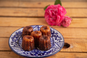 French pastry Caneles de bordeaux rum and vanilla flavor thick caramelized..