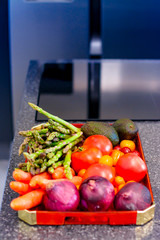 Vegetable and fruit tray in a modern kitchen