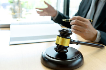 Judge or lawyer talking  with team