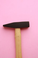 The claw hammer in colorful background