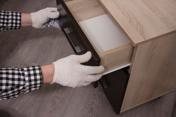 Repair and installation of furniture in the room.