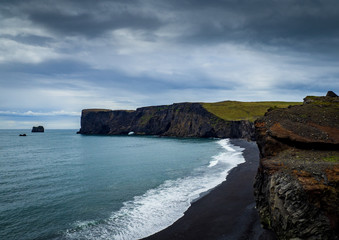 Fototapeta na wymiar Dangerous black beach at Reynisfjara in Iceland