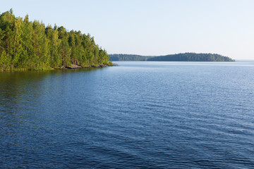 Fototapeta na wymiar Summer morning lake landscape in Finland