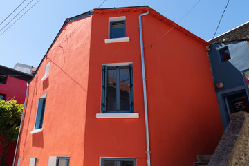 Orange large fishing house in Trentemoult in Brittany France