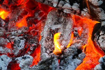 Beautiful countryside summer celebration view of burning wood from middle.