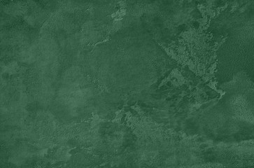 Dark green Concrete textured background to your concept or product. Winter 2020 color trend.