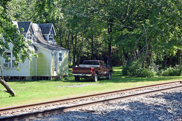 House by Railroad Tracks