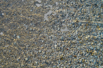 Sea pebbles. Small stones gravel texture background. Pile of pebbles, thailand.Color stone in background.