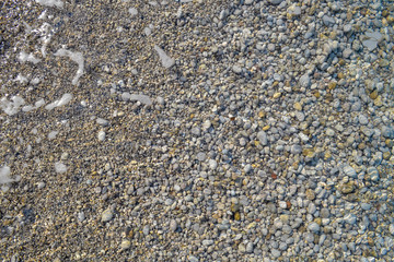 Sea pebbles. Small stones gravel texture background. Pile of pebbles, thailand.Color stone in background.
