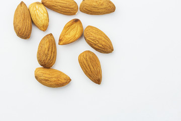 almonds isolated on white background, close-up