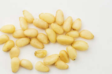Cedar Pine nuts on a white background