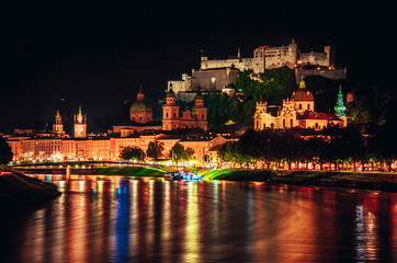 Fototapeta premium Salzburg Panoram in the Night, Salzach River and Hohensalzburg Fortress