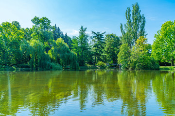 Fototapeta na wymiar A small lake in Ujazdow Park, public park in Warsaw, Poland