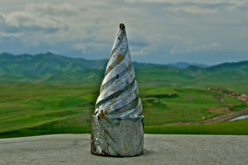 Pointed metal thing on backrest at a rest stop, Interstate 5 near Tracy, California 