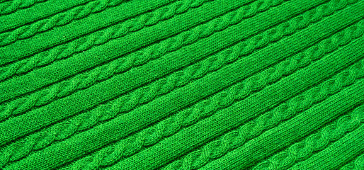 Knitted blanket. Soft and warm fabric. Texture for background or illustrations.