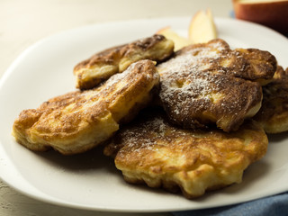Close up of crepe with apples against white background