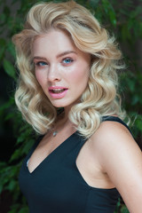 Fototapeta premium Beauty studio blonde woman portrait. Perfect skin, nude make-up, blonde hair style. Skincare facial treatment female health concept. Isolated