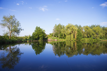 Obraz premium Summer fishing on a beautiful lake