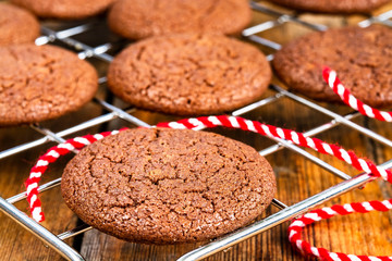 Homemade chocolate cookies on a grid