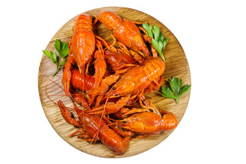 Boiled crayfish on wooden cutting board isolated on white background