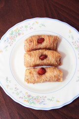traditional Turkish Arabian oriental sweetness baklava on white plate