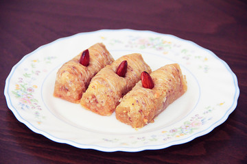 traditional Turkish Arabian oriental sweetness baklava on white plate