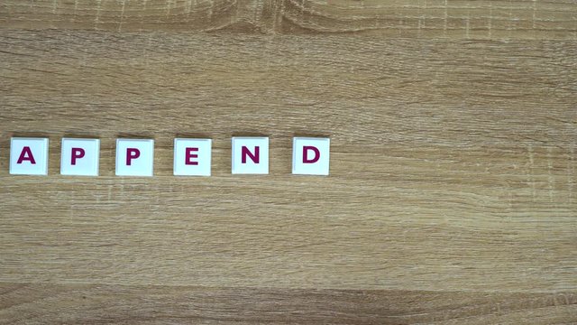 Word "Appendices" is made up of letters on a wooden background. Design for presentation of business idea, startup, report. Word "Appendices" is written from letters on table. Video saver.
