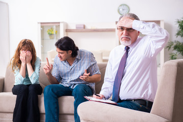 Young pair visiting experienced doctor psychologist
