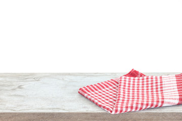 Empty wooden desk table and red checked tablecloth over mint wallpaper background