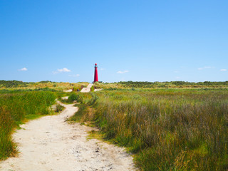 View of the North Tower - lighthouse in Schiermonnikoog islands one of the Frisian Islands, on sand...