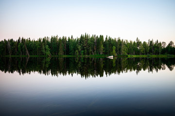 Fototapeta na wymiar Lake and reflection of trees