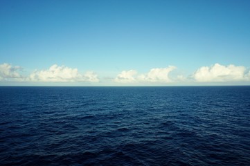 sea and blue sky and clouds