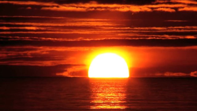 Sun rising above sea,  Betsukai,  Hokkaido,  Japan