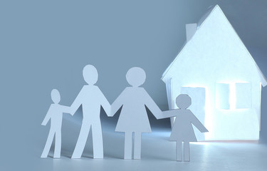 home and men made of paper.the concept of a mortgage.