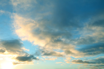 Sunlit clouds sky background