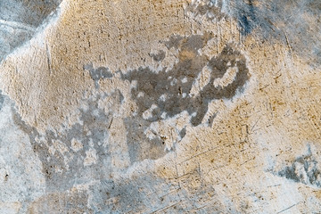 Art rough stylized texture banner with space for text. Blue and yellow background texture decorative plaster. Grungy concrete wall with multi-colored lighting. Old gray surface with blurred edges.