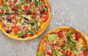 Delicious pizza on stone background.