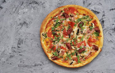 Delicious pizza on stone background.