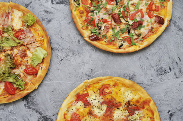 Delicious pizza on stone background.