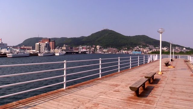 Pier with view of Mount Hakodate,  Hakodate,  Hokkaido,  Japan