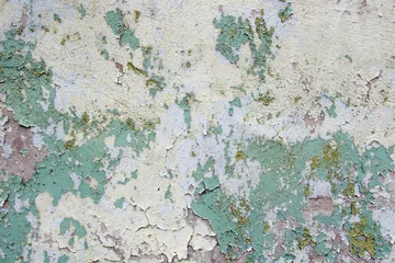 Foto op Plexiglas Verweerde muur old cracked yellow green paint on the cement wall