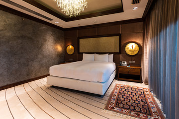 Interior of modern luxury bedroom. Hotel room style