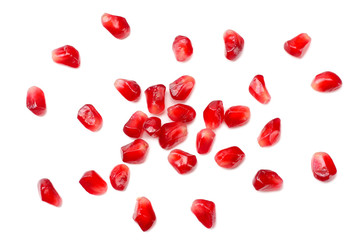 pomegranate seeds isolated on white background. top view