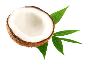 half of coconut with green leaves isolated on white background
