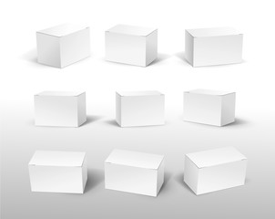 Set of white box mockup. 9 blank packaging boxes, cube perspective view and cosmetics product package mockups 3d. Vector illustration. Isolated on white background.