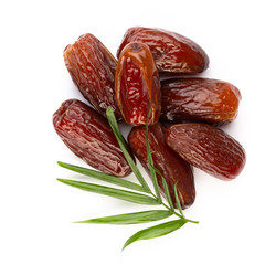 Dry dates isolated on white background. Top view. Flat lay pattern.